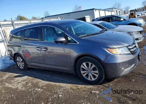 2014 Honda Odyssey Ex z USA, uszkodzony, nr VIN 5FNRL5H46EB106710